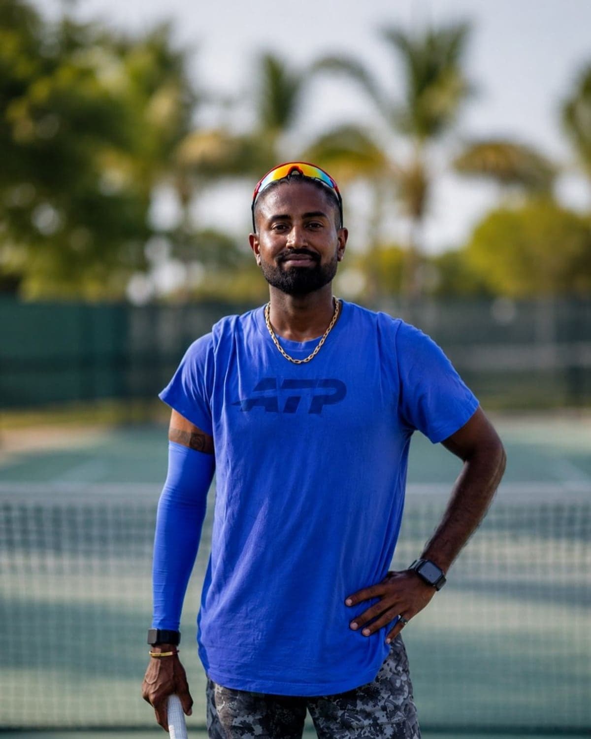 Vishwesh Sinha, tennis coach