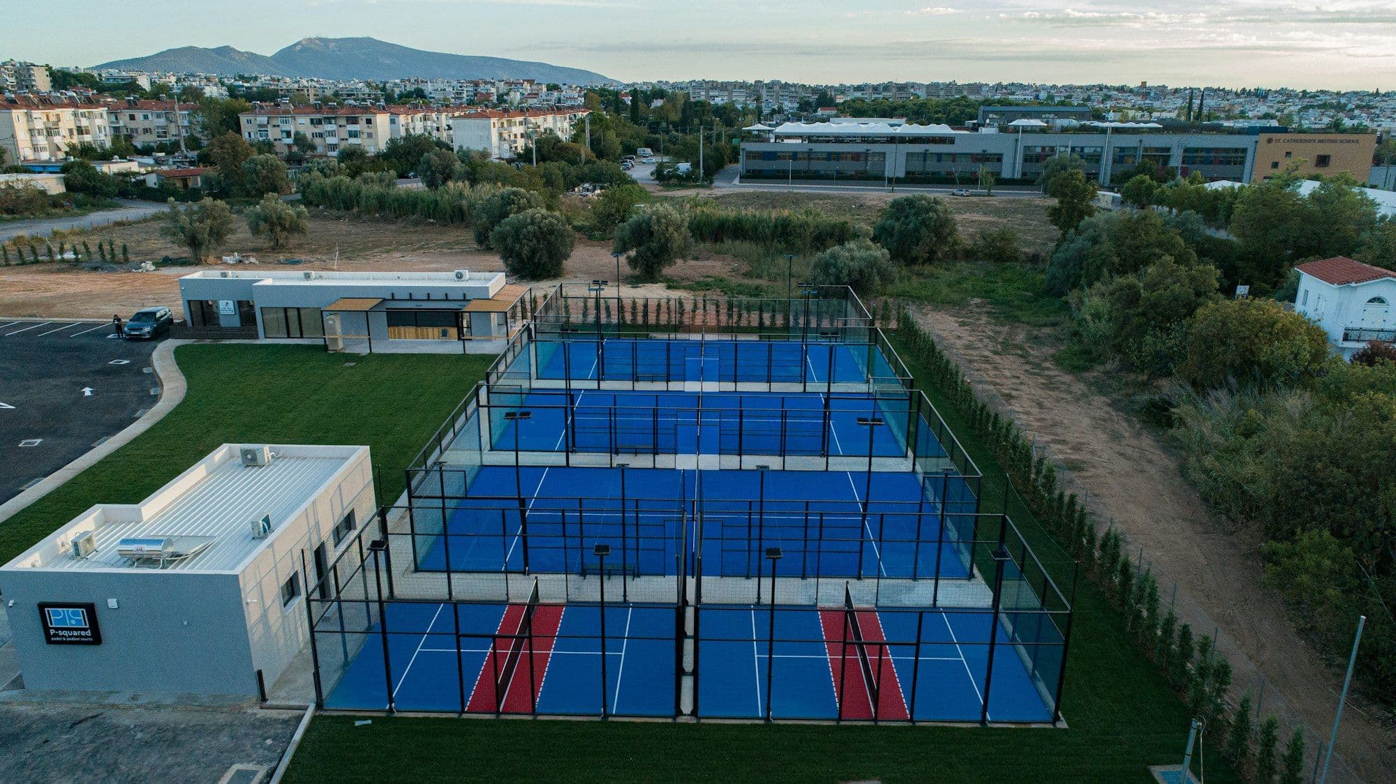 Aerial view of padel courts inside a residential community
